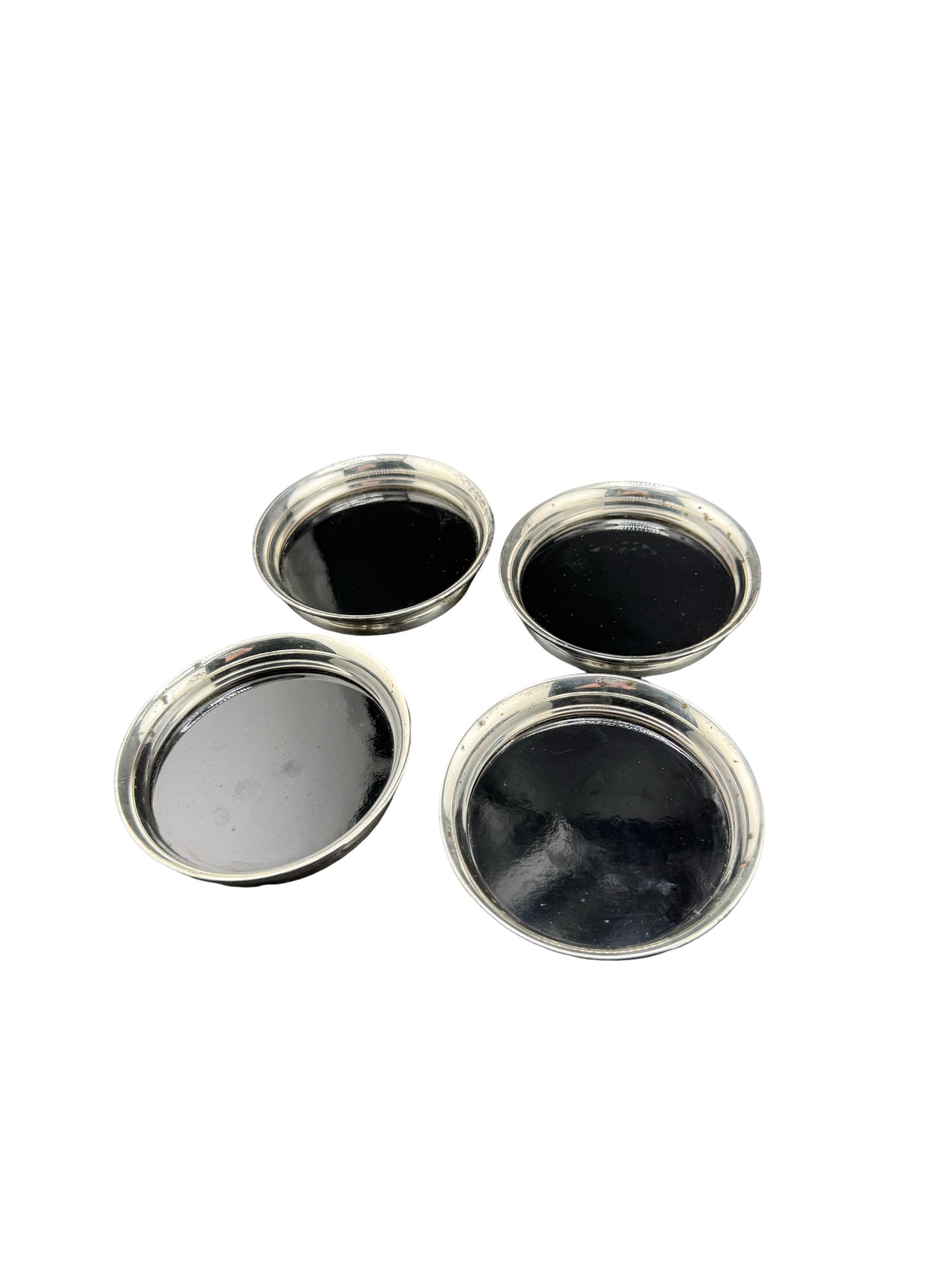 Sterling Silver? Black Enamel Coasters - Set of 4 - Charleston Estate: PLEASE READ: in house shipping within the US If you win this item, please select self arranged for in house shipping when paying invoice Sterling Silver? Black Enamel Coasters - Set of 4 3.5" Not mark