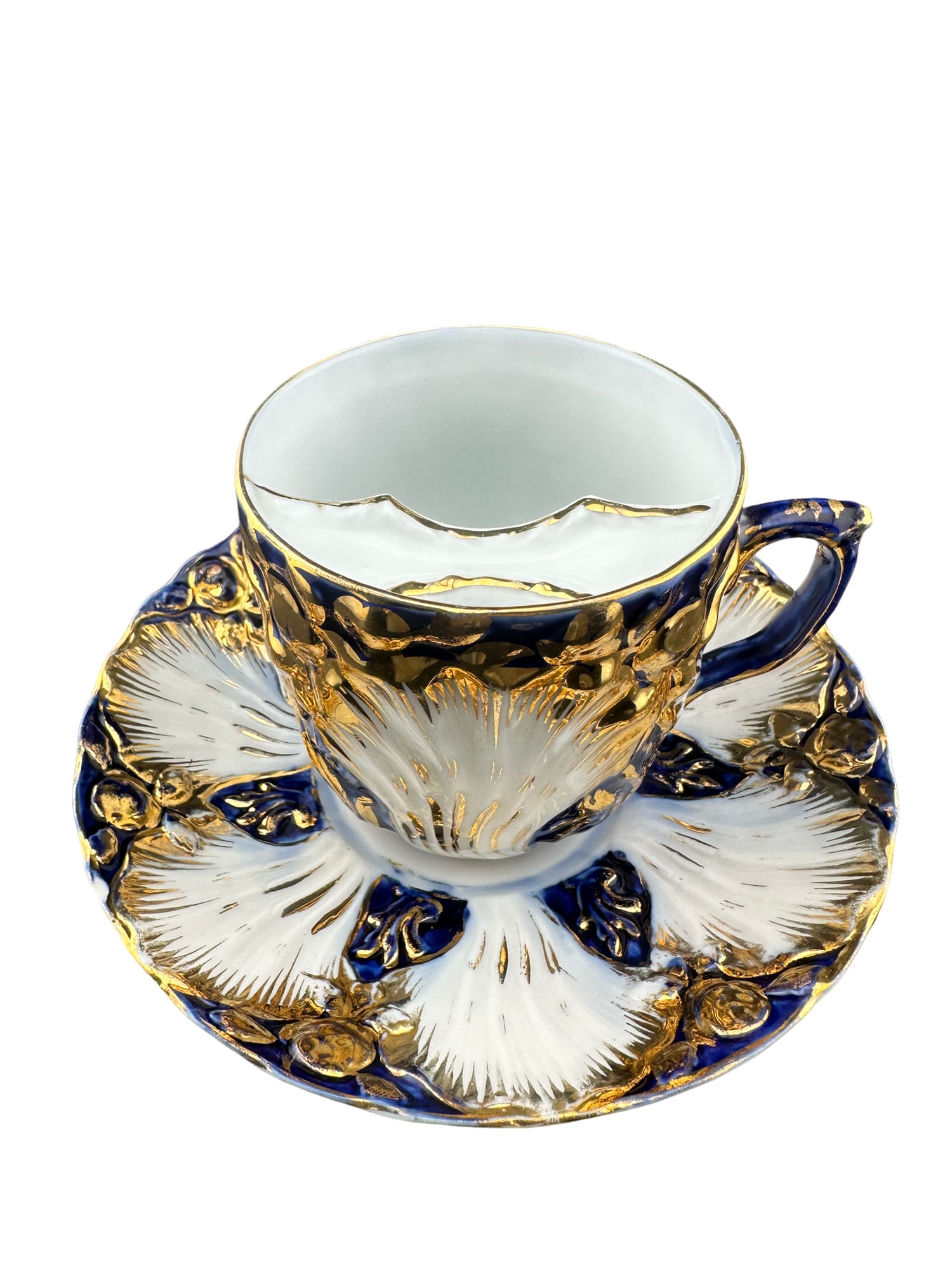 Antique Porcelain Mustache Cup & Saucer, Cobalt Blue & Gilt Floral Decor: PLEASE READ:in house shipping within the USIf you win this item, please select self arranged for inhouse shipping when paying invoice Antique porcelain mustache cup and matching saucer featuring an el