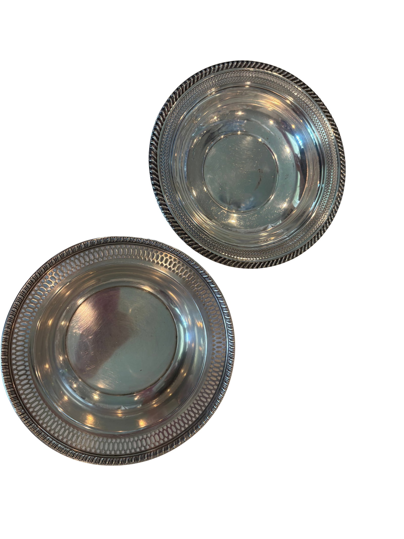 Pair of Sterling Silver Pierced Gorham Candy Dishes - #336: PLEASE READ: in house shipping within the US If you win this item, please select self arranged for in house shipping when paying invoice Pierced stylized trellis with an outside gadrooned border 5.75"