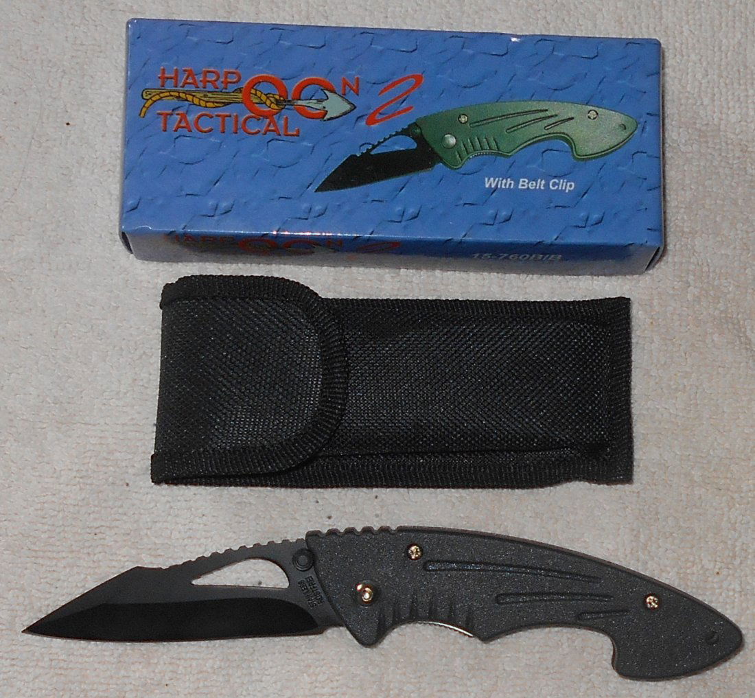 Harpoon Tactical 2 Knife: Has box, holster and belt clip, China, lock blade, see photos, shipping or pick up in Sumrall.