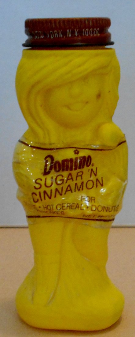 Domino Sugar N Cinnamon Shaker: Girl, has lid and label, see photos.