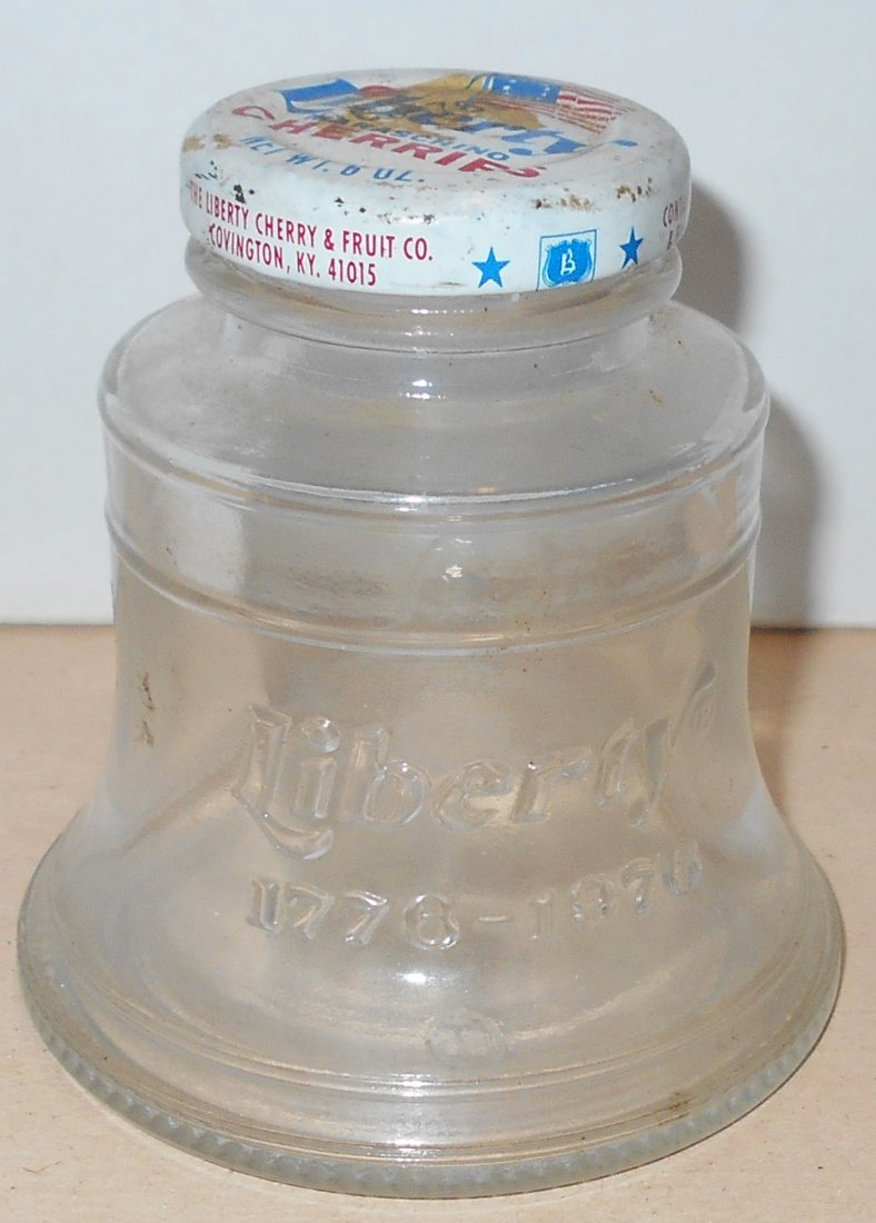 Liberty Bell Jar: Cherry jar shaped like Liberty Bell, has lid, see photos.