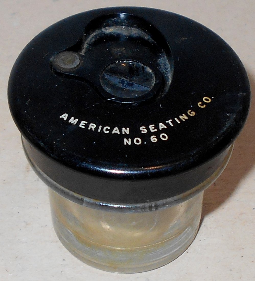 Ink Bottle: American Seating Co. No. 60, this is the ink bottle for the old school desk, see photos.