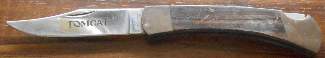 Folding Lock Blade Knife: CI, stainless, 506 Japan, Tomcat on blade, see photos.