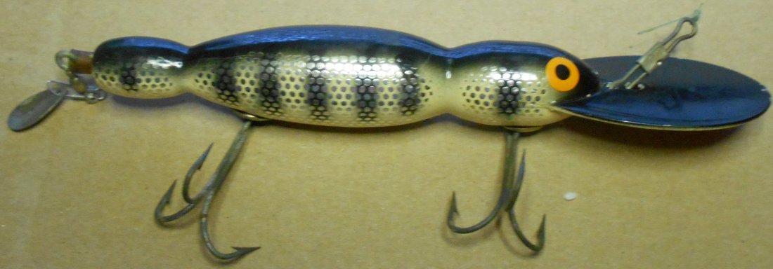 Fishing Lure: Bomber Water Dog, paperwork and box, see photos.