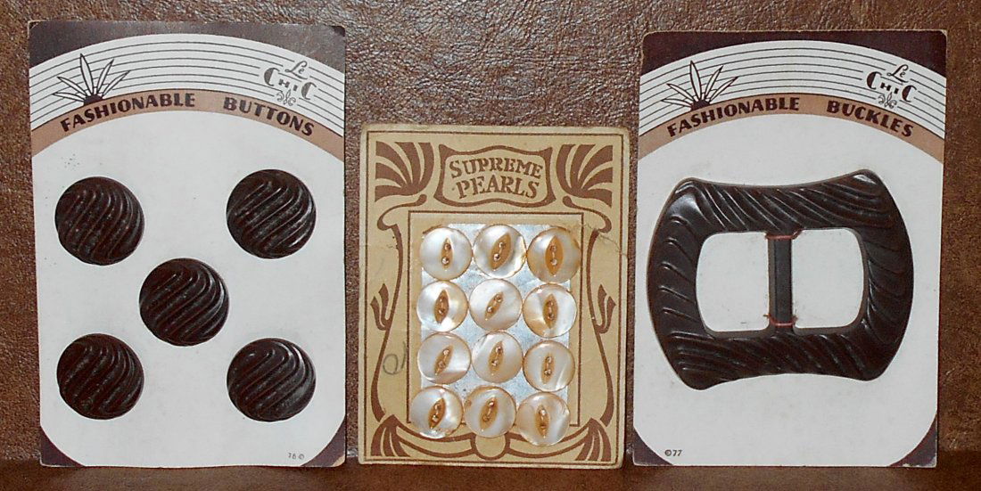 Buttons & Buckle Lot: Buttons and buckle on card, see photos.
