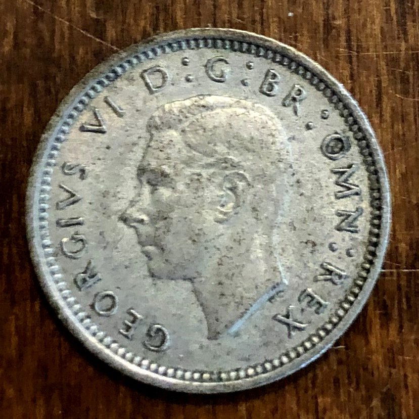 England 1943: WWII era coin, three pence, see photos.