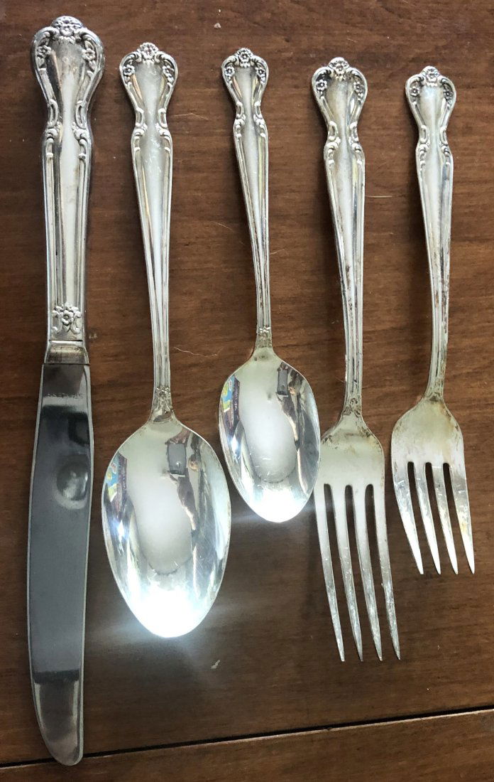 Flatware Setting: Five pieces of Rogers silver plate, in box and plastic sleeves, removed for photos.