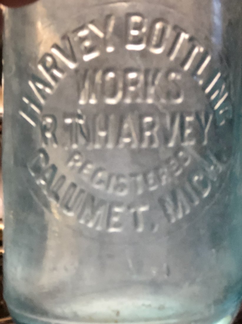 Hutchinson Style Bottle: Harvey Bottling Works, R. T. Harvey, Calumet, Mich., see photos.