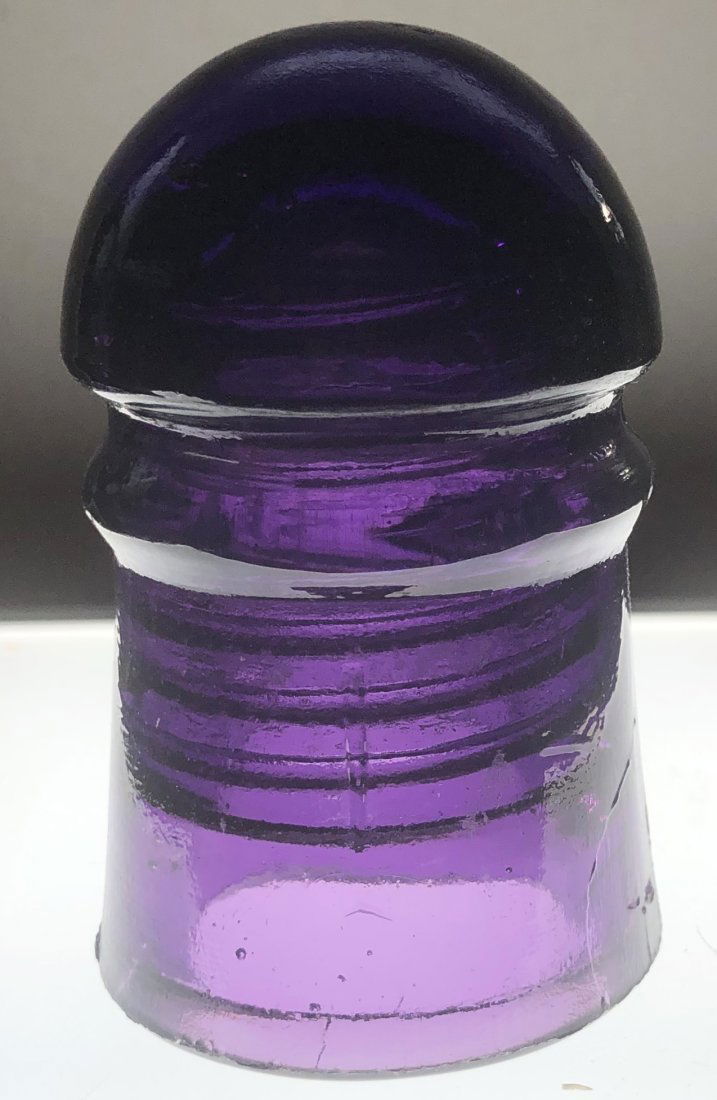 Insulator: Faint diamond embossed on side, see photos.