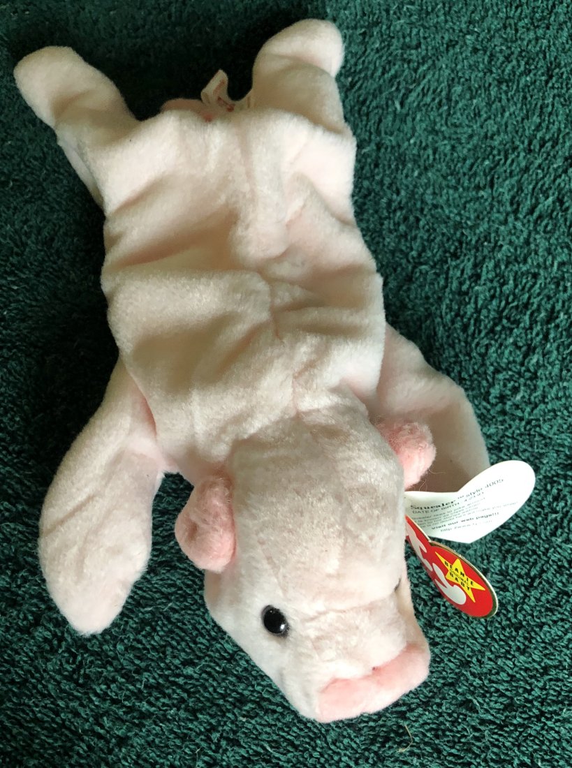 Beanie Baby: Squealer, has both tags, see photos.