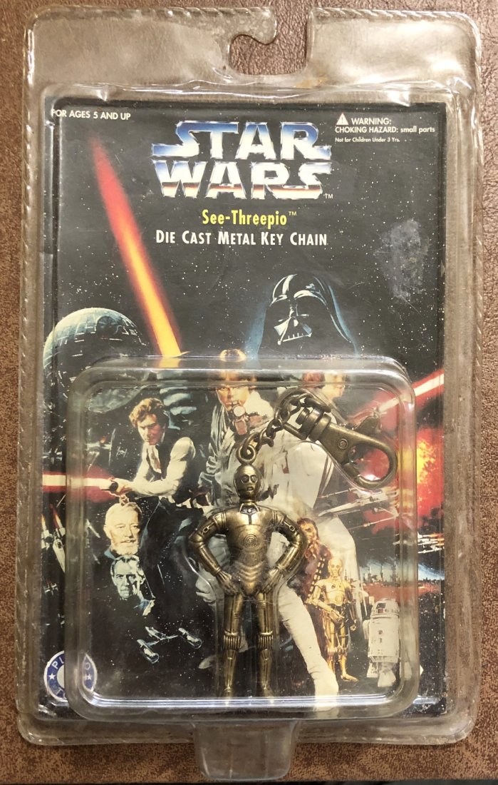 Star Wars: See-Threepio die cast metal key chain.