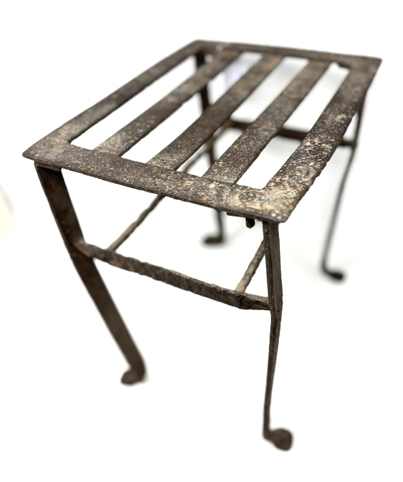 Hand Forged Hearth Warming Trivet: Offering a hand forged hearth warming trivet that would sit in the fireplace over coals to keep the food warm. 11” wide x 8 3/4” deep x 12” high. Has 4 legs with penny feet and a 5