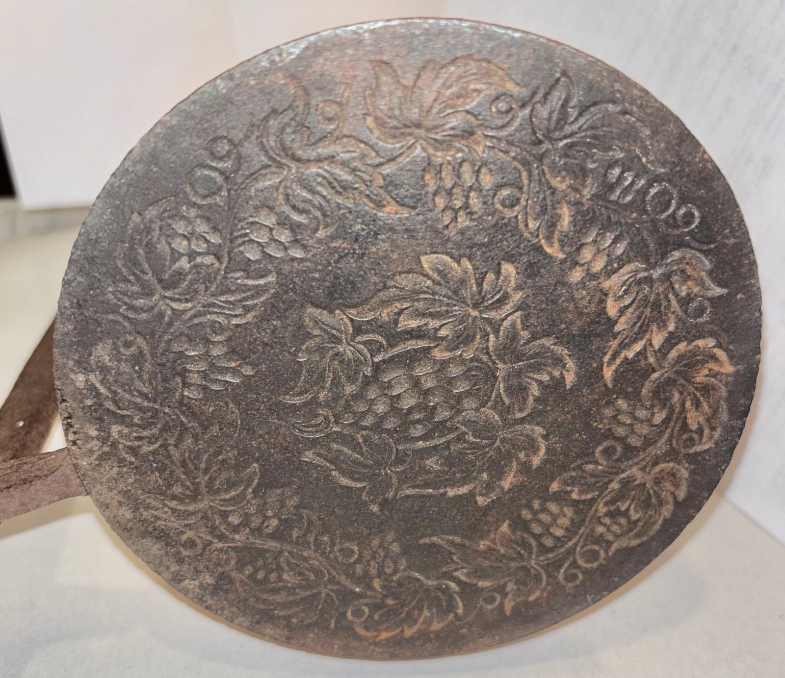 18th Century Wafer Iron: A late 18th century wafer iron with a floral design on both wafer plates. It is 5 1/4” dia. X 25” long. Circa. 2nd half of 18th century. ex. VA. collection. C-1195. Third party shipping.