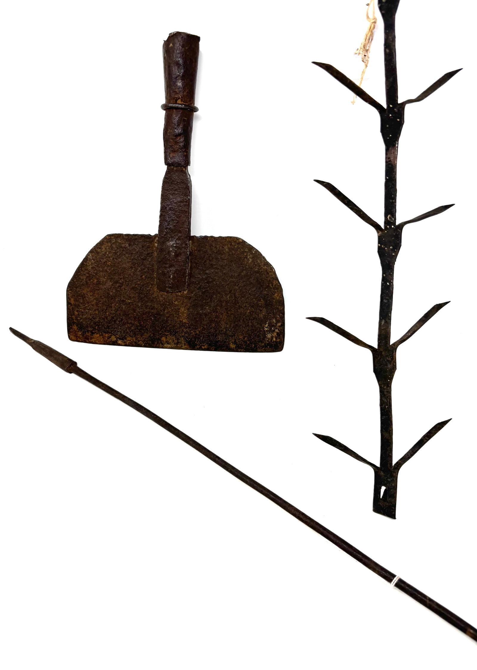 Three Early Iron Items: Here is a hearth scraper or peel end, a drying rack-corn, and an unknown adjustable sliding arm-measuring tool. The drying rack and adjustable arm are 19 and 28 inches respectively, The adjustable arm