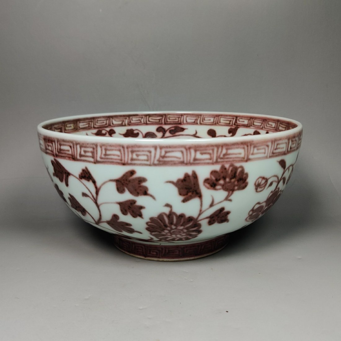 Ming Dynasty Hongwu year-made underglaze red lotus bowl: Ming Dynasty Hongwu year-made underglaze red lotus bowl Items are brightly colored and beautifully patterned. Great culturalatmosphereã€‚