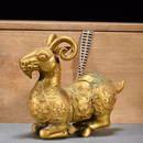 Gilt bronze and chiselled flower lying sheep ornament