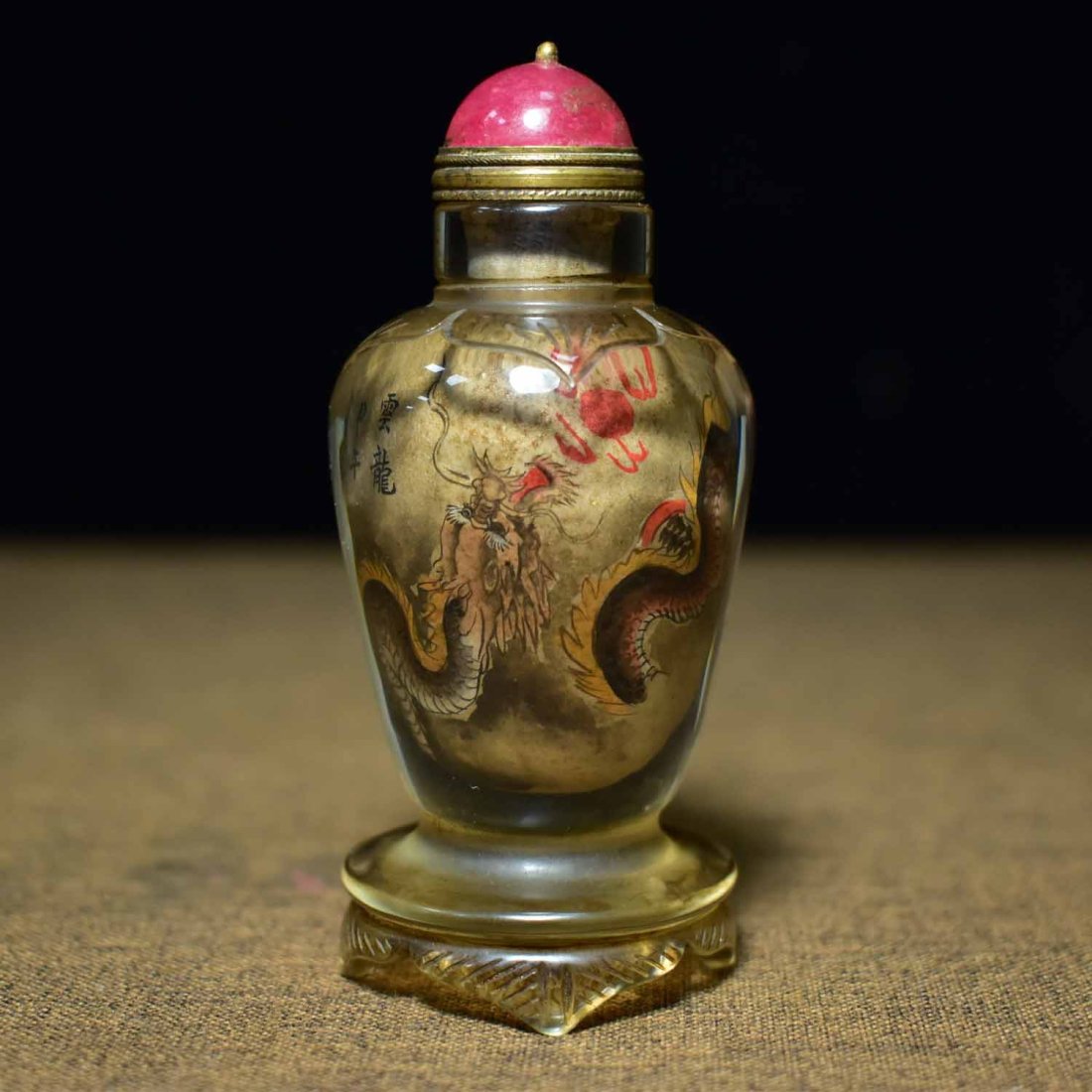 liuli handmade snuff bottle with carved dragon on the outside and painted on the inside: liuli handmade snuff bottle with carved dragon on the outside and painted on the inside.The item is exquisitely carved and well preserved. Good quality, round and shiny, with cultural flavor.