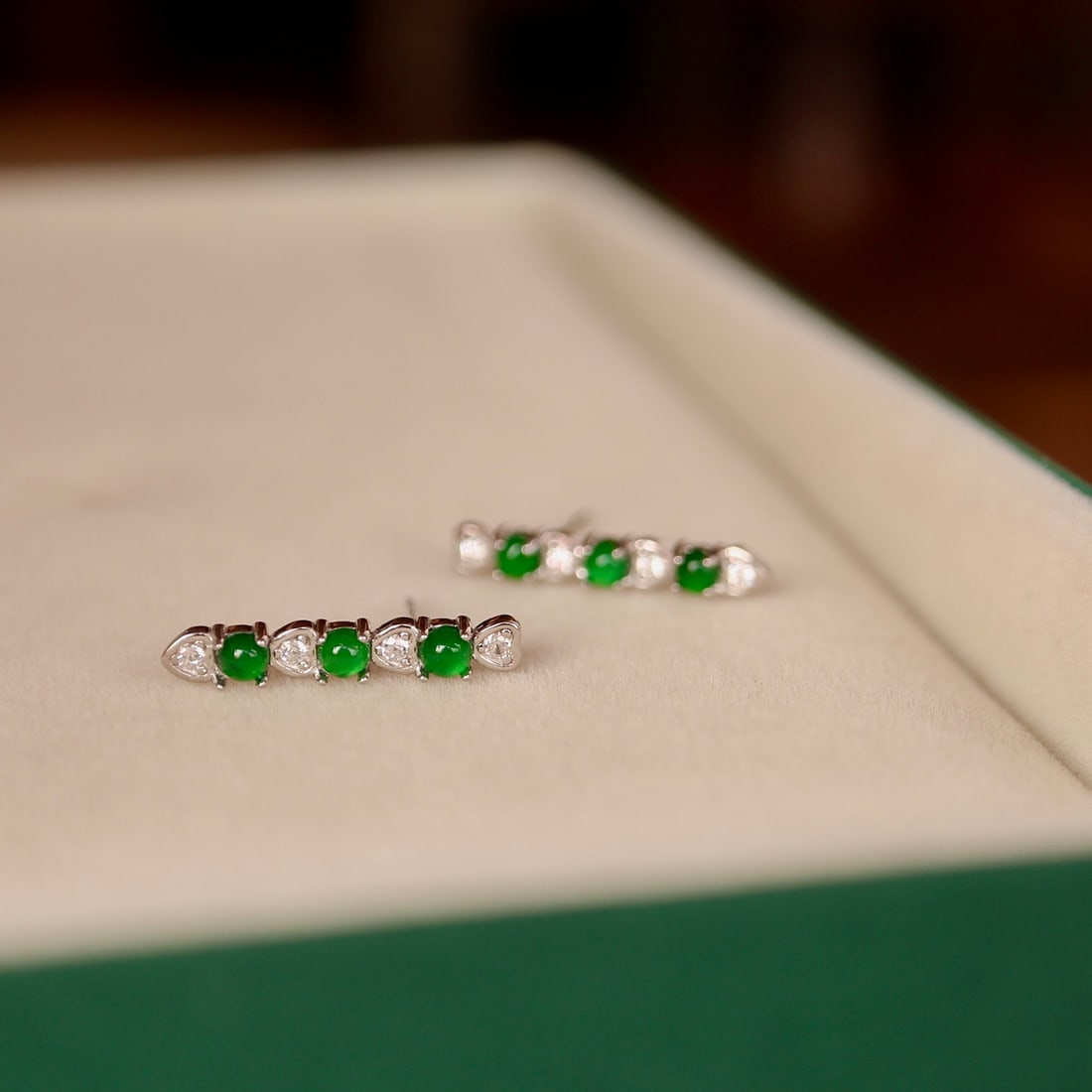 Natural Jade Earrings with Tassel Design: Natural jade earrings with tassel design, embellished with imperial green jade, simple and elegant, wearing effect