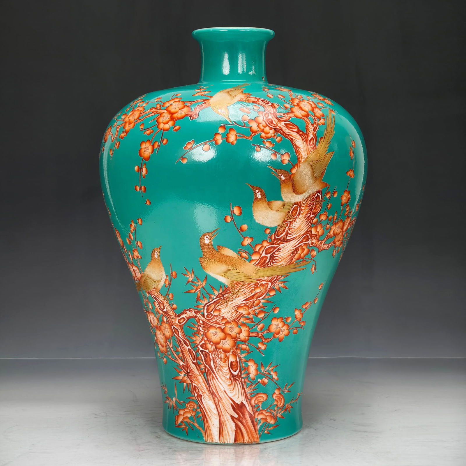 Qing Dynasty Qianlong Style Turquoise Green Glaze Enamel 'Joy Upon the Plum Branch' Vase: Qing Dynasty Qianlong style celadon green glaze famille-rose 'Plum Blossom and Sparrow' vase, height 39 width 25 centimeters