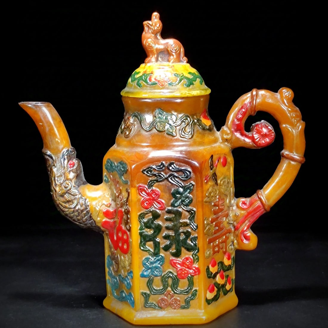 A Qing dynasty painted amber and honey wax teapot (1 of 8)