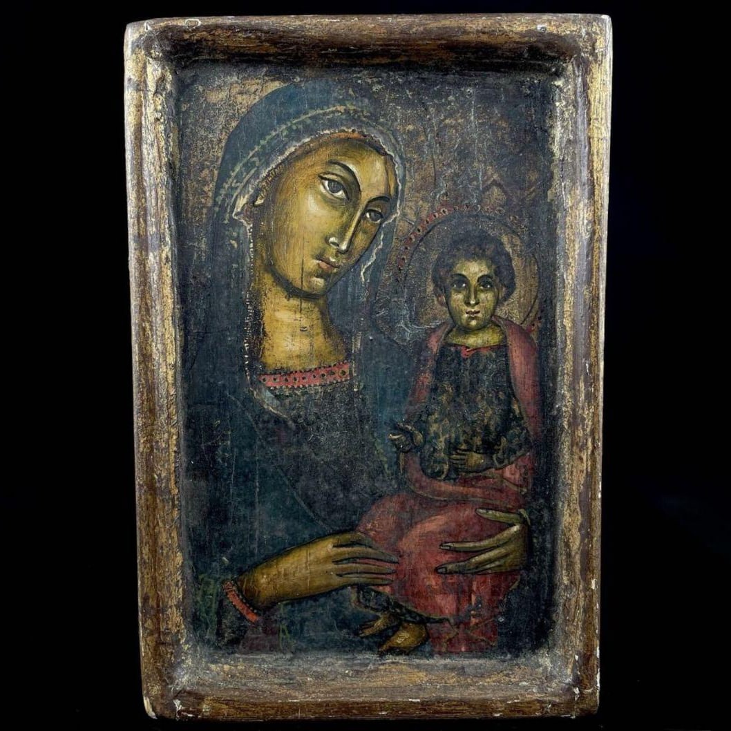 Madonna and Child Icon – Hand-Painted Religious Panel – Wooden Polychrome: A religious artwork depicting the Madonna and Child, rendered in traditional icon style. This wooden panel icon portrays the Virgin Mary holding the Christ Child, a sacred subject central to Christian