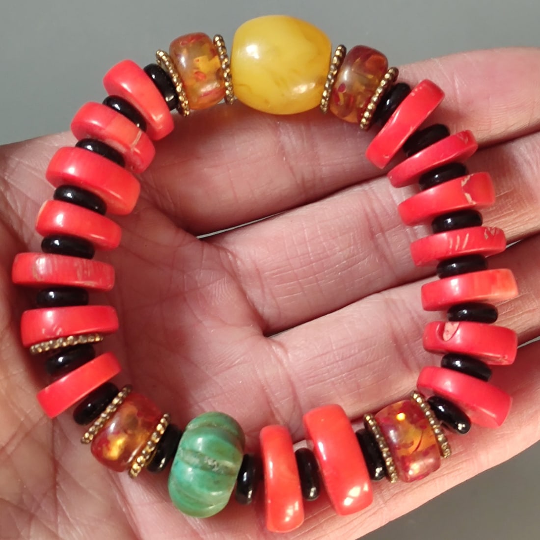 Red coral bracelet, accented with amber beads and turquoise beads. (1 of 8)