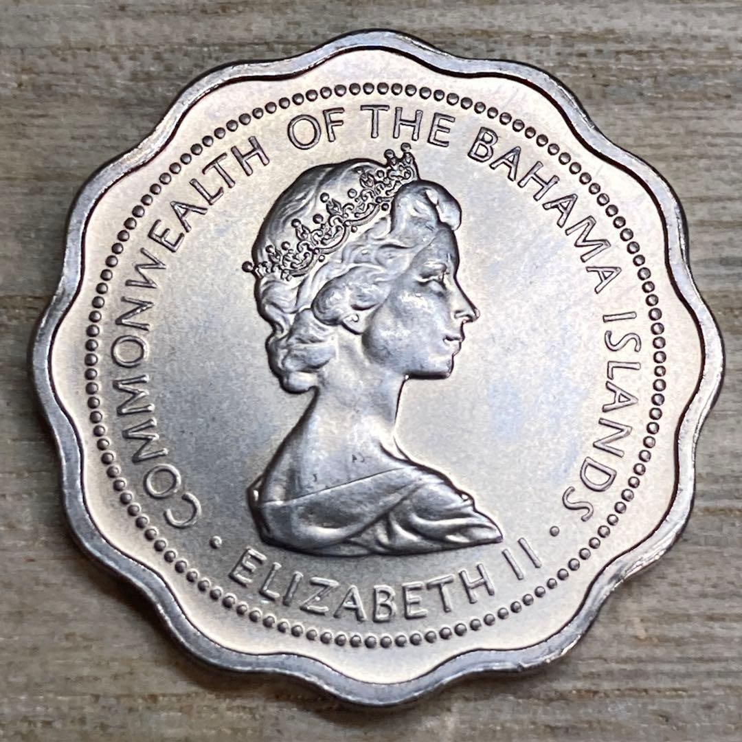 A 10-cent coin issued in the Bahamas in 1973. (1 of 8)