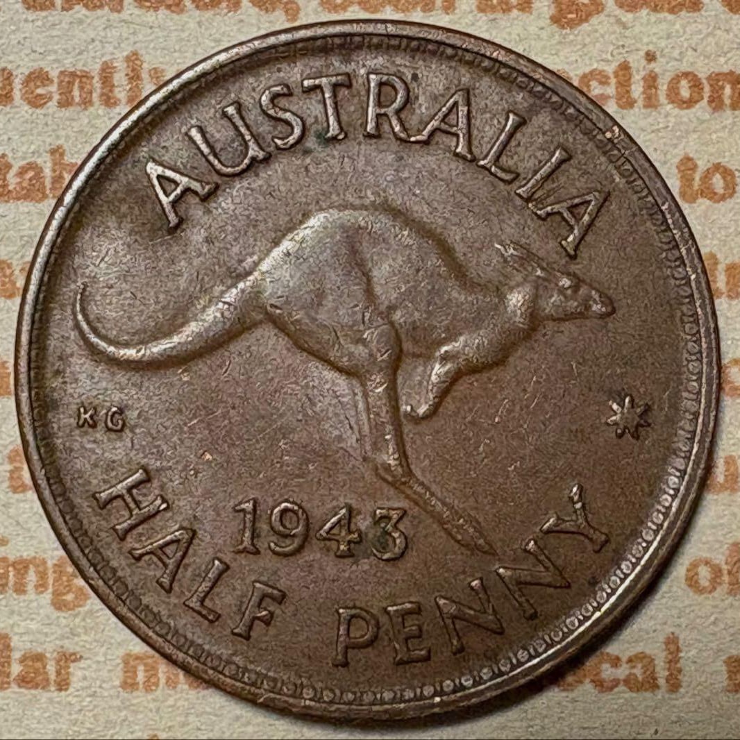 1943 Australian half penny coin: Country: Australia Denomination: Half Penny Year of Issue: 1943 Design: Portrait of King George VI Features: Kangaroo motif