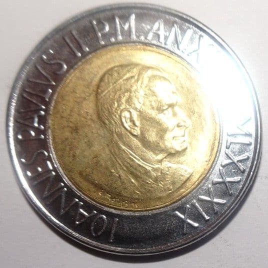 Vatican 500 lira coin, with a diameter of approximately 25 millimeters. (1 of 2)