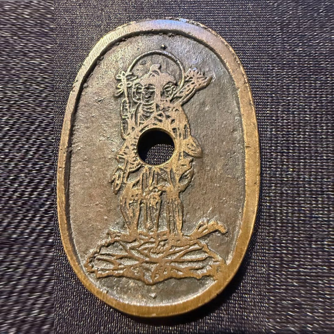 Japanese coin with decorative patterns, Tenpo Tsuho type, obverse design. (1 of 4)