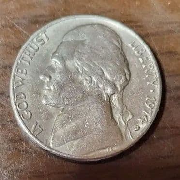 In 1974, a Ribate-5 in the United States cost 5 cents.: This is a 1974 American nickel coin watch, featuring the portrait of Thomas Jefferson on the dial. Year: 1974 Dial design: Thomas Jefferson portrait Reverse design: Monticello building Country: United