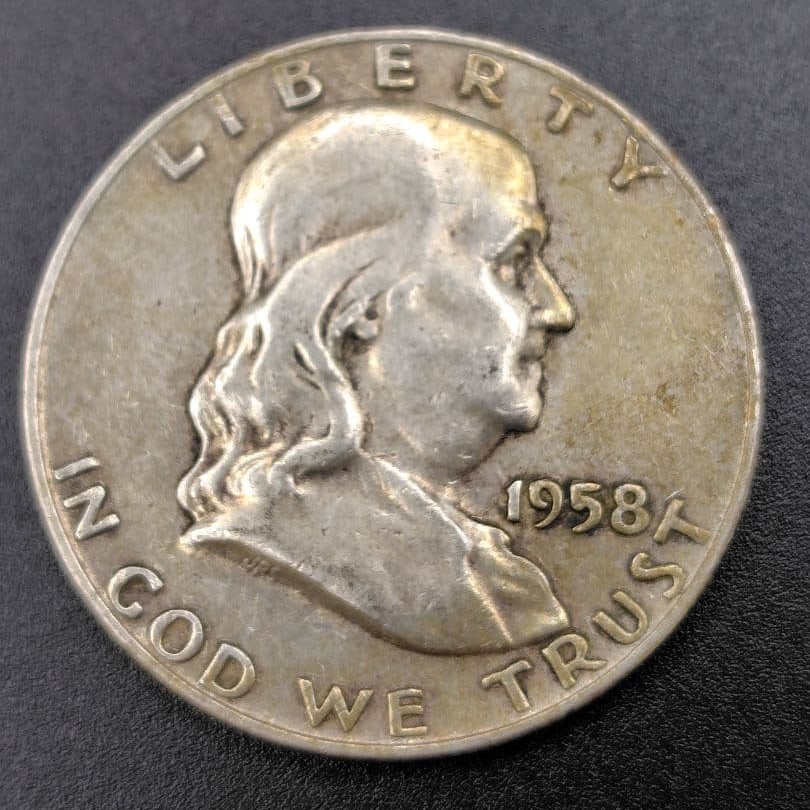 1958 edition of the Franklin Half Dollar (50 cent silver coin) (1 of 7)