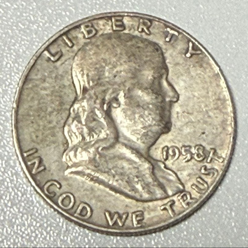 In 1958, Franklin half dollar coin was worth 50 cents. (1 of 2)