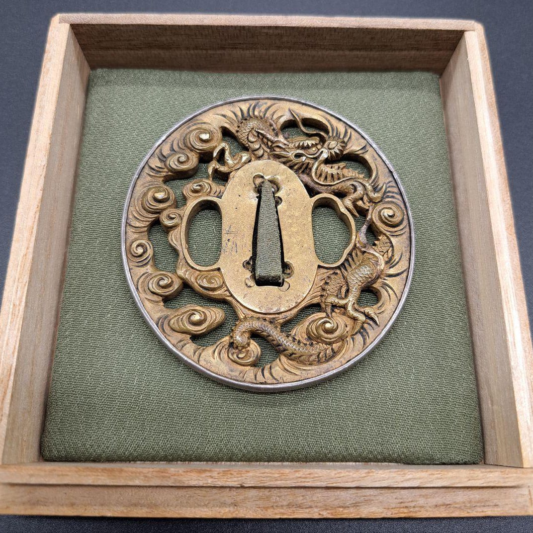 Exquisite brass sword guard. (1 of 8)
