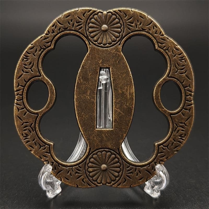 Chrysanthemum patterned hand guard (Tsuba), made of alloy material. (1 of 6)