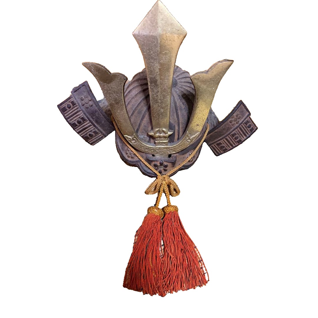 Metal helmet design with tassel. (1 of 4)