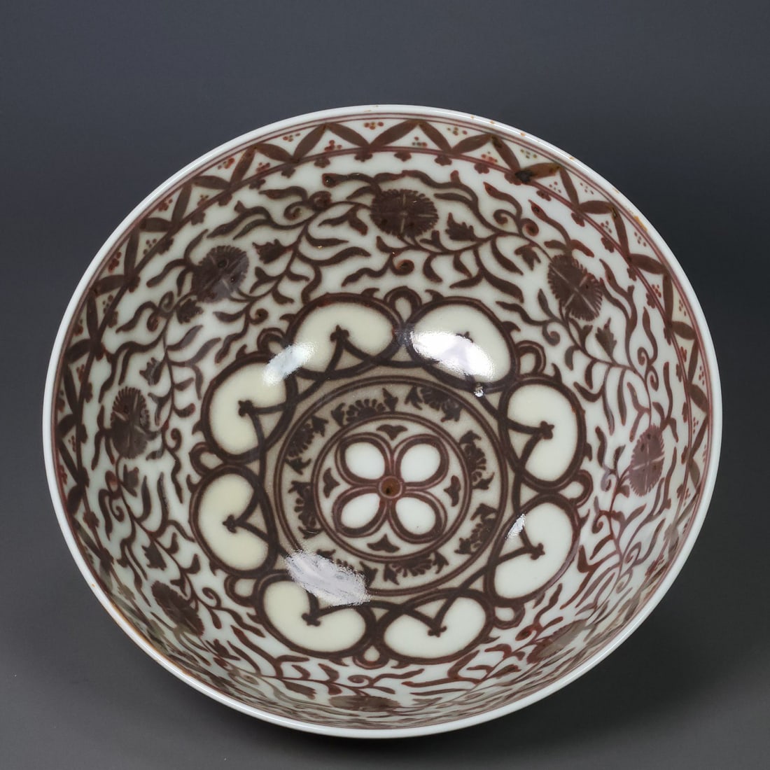Ming Dynasty copper-red glazed bowl with floral design (1 of 9)