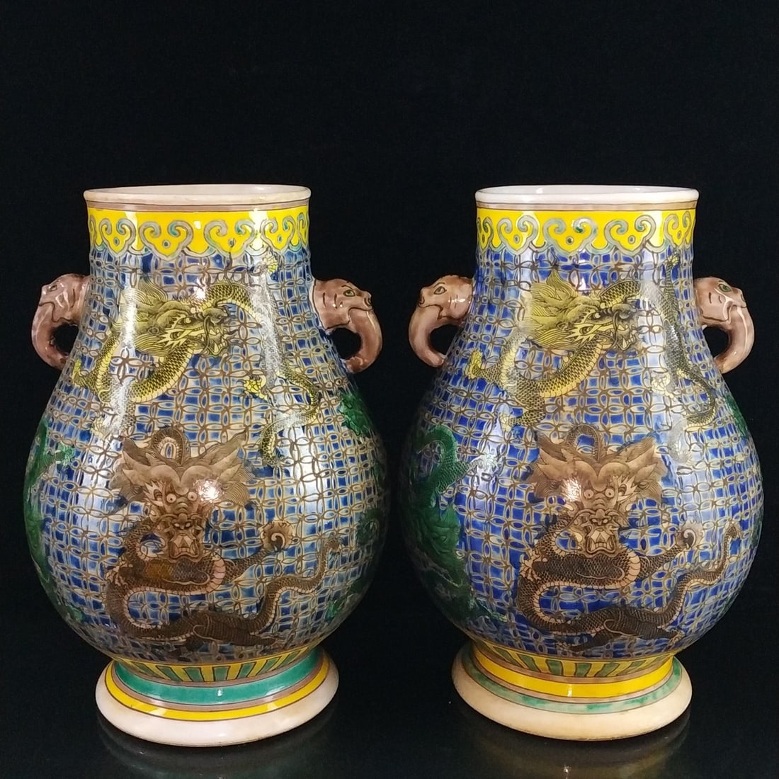 Pair of Qing Dynasty Qianlong period famille rose hand-painted dragon pattern elephant nose vases. (1 of 9)