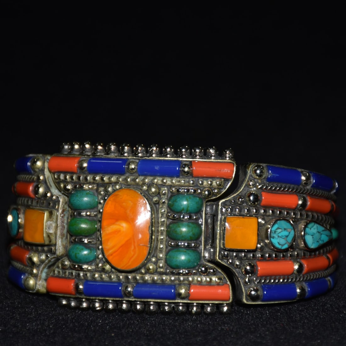 Copper bracelet inlaid with amber, turquoise, lapis lazuli, and rubies (1 of 9)