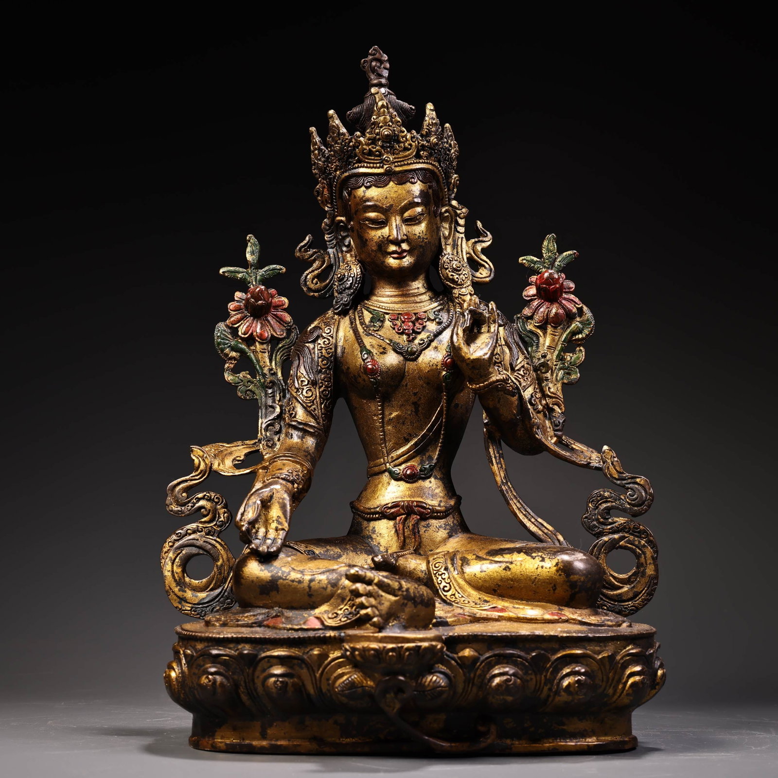 A copper high relief carved and engraved statue of the Green Tara, a Tibetan Buddhist deity. (1 of 16)