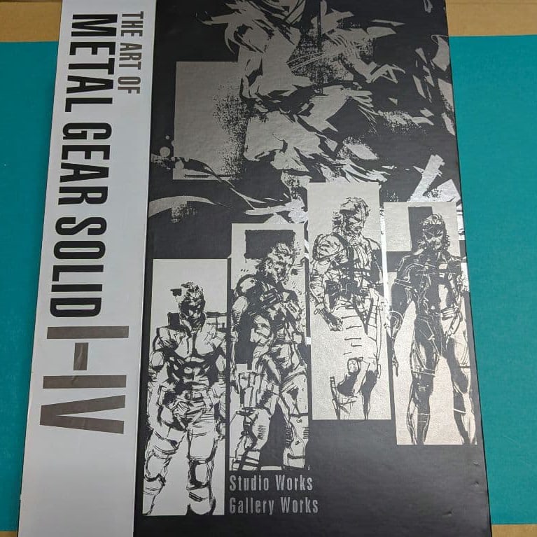Art Setting Collection of "Metal Gear Solid 1-4": This "Metal Gear" Art Setting Collection is a must-have hardcover for fans, featuring numerous studio works and gallery pieces. Overall, the condition is good. Title: Art Setting Collection of Metal G