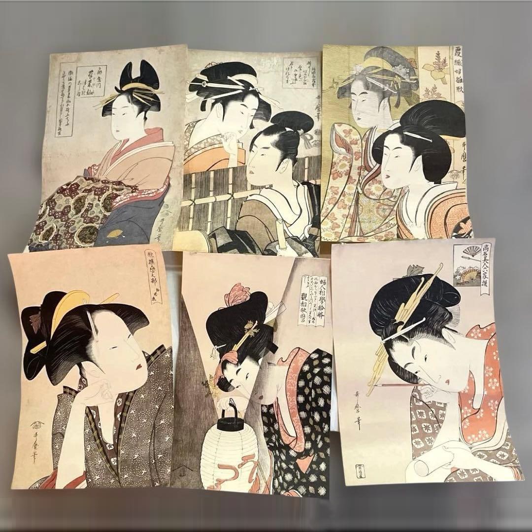 Utamaro Ukiyo-e Replica, Set of 6 Female Portraits: This is a replica of Utamaro. A set of six traditional Japanese ukiyo-e prints depicting female portraits. It is stored in a cylindrical container. There are glue residues and a small tear on the uppe