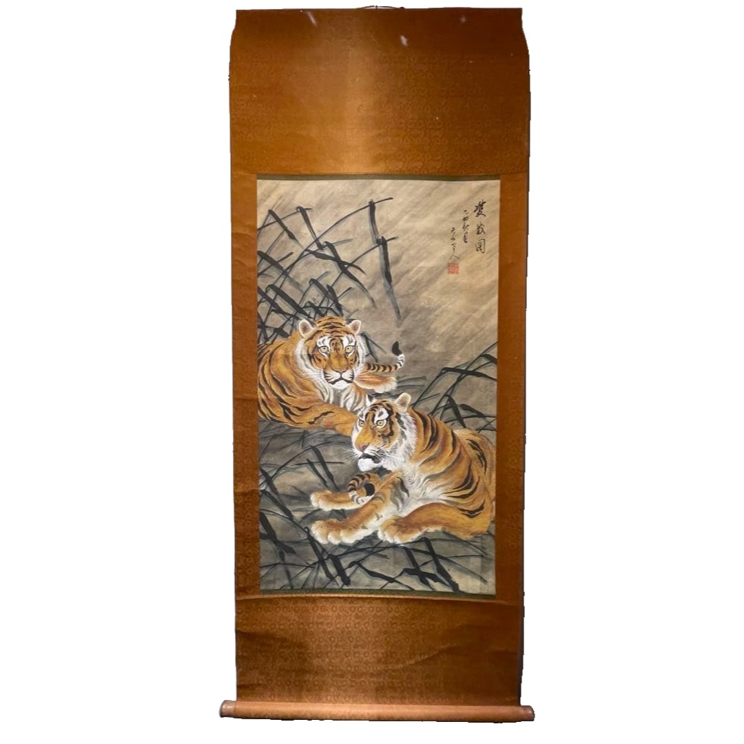 Hanging scroll, Japanese painting, depiction of a tiger.: The depiction of the tiger in this Japanese painting is lifelike, with intricately detailed rendering that captivates the viewer. Subject: Tiger Technique: Japanese Painting Material: Paper Colors: Or