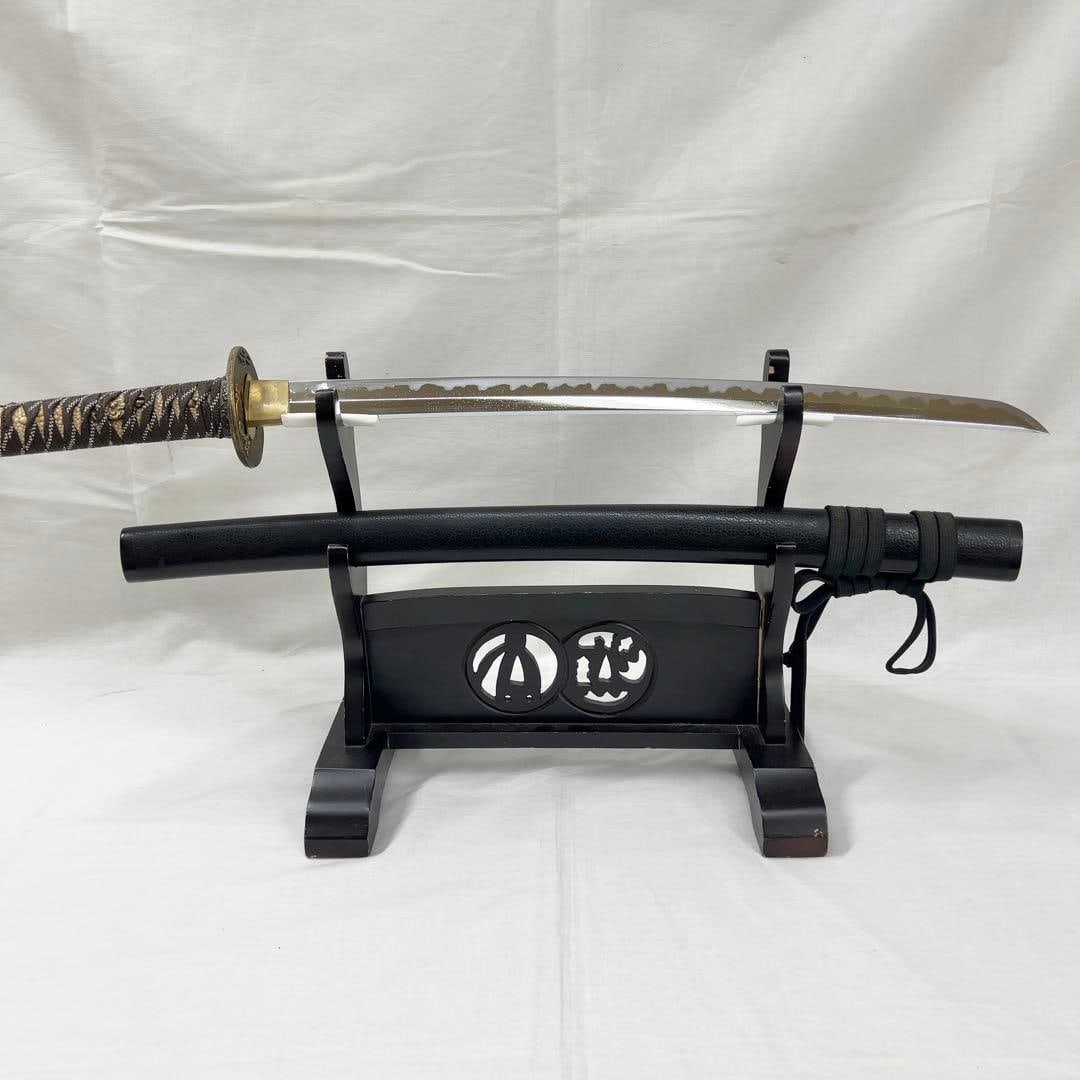 Wakizashi (Tanto) - Black lacquered scabbard, iron tsuba (handguard), gold hilt, battle motifs,: Wakizashi (Tanto) - Black lacquered scabbard, iron tsuba (handguard), gold hilt, battle motifs, total length 64 cm Blade length: 44.0 cm [Curvature] 0.6 cm [Habaki (collar)] 2.3 cm [Original width] 2.