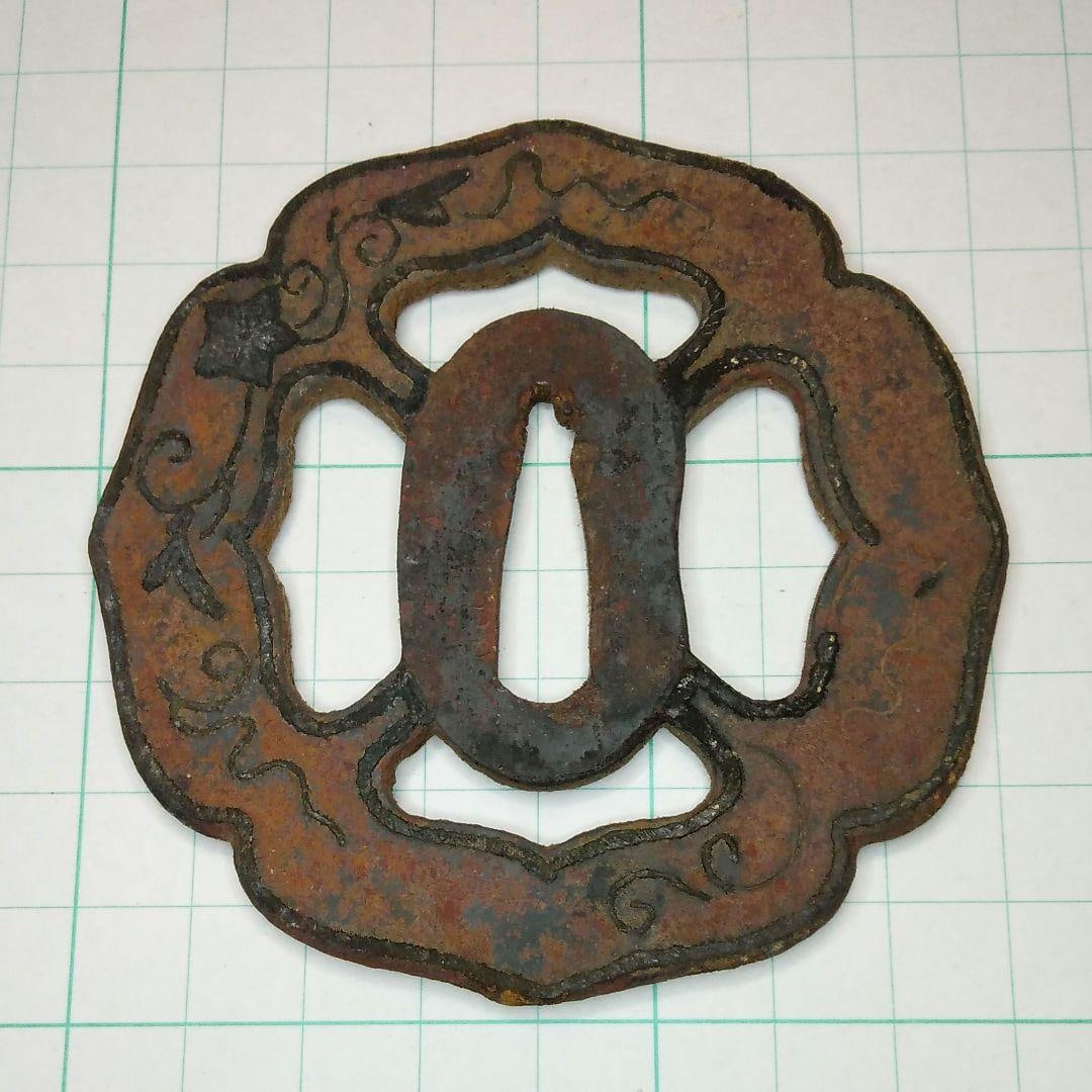 Sword guard, iron sword guard, antique.: This is an iron sword hilt guard, exhibiting rust and stains. It is an antique piece.