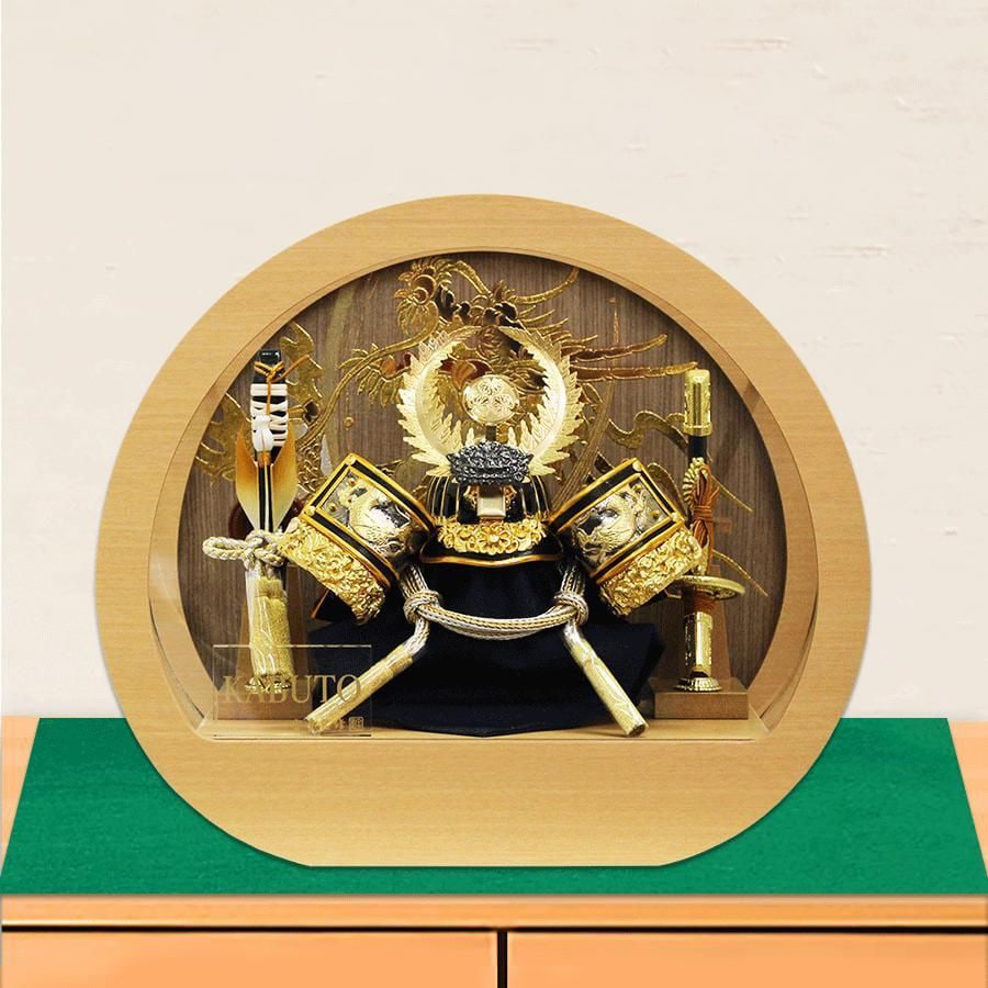 A Tokugawa Ieyasu Helmet with Five-in-One Design Offered by Hodo: A Tokugawa Ieyasu No. 5 Helmet presented by Hodo, housed in a white wooden frame and acrylic circular display case. This is a luxurious helmet display cabinet featuring a miniature version (No. 5 size