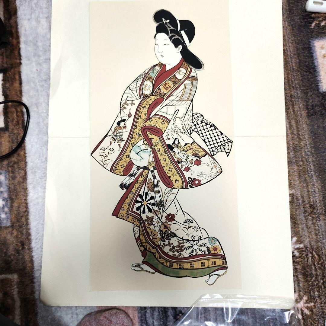 A larger size, hand-painted, depicting a woman wearing a kimono. (1 of 4)