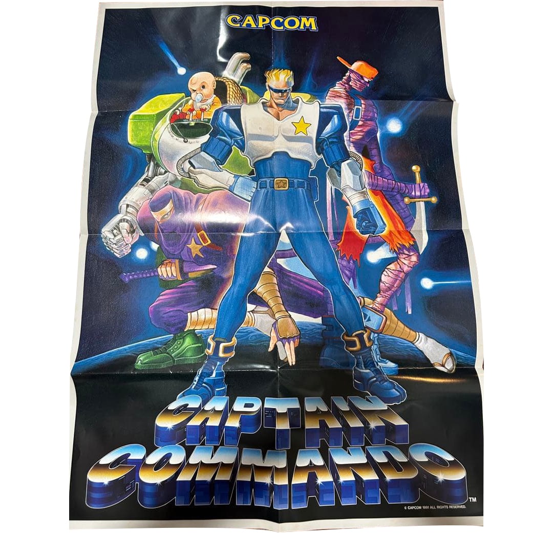 Capcom "Captain Commando" B1 Size Poster: This is a B1 size poster of the CAPCOM arcade game "Captain Commando," not a reprint. Illustrated by Yasuda Akira (Akiman). The poster was once folded to B4 size, with dust on the surface that has bee