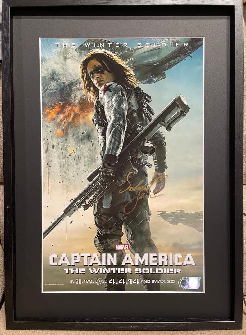 Authenticated Edition Sebastian Stan "Captain America" Signed Poster, Framed, 11x17.: This is a Sebastian Stan signed edition of the "Captain America" poster, purchased through SWAU. The poster measures 11x17 inches and comes with a certificate of authenticity. It will be shipped frame